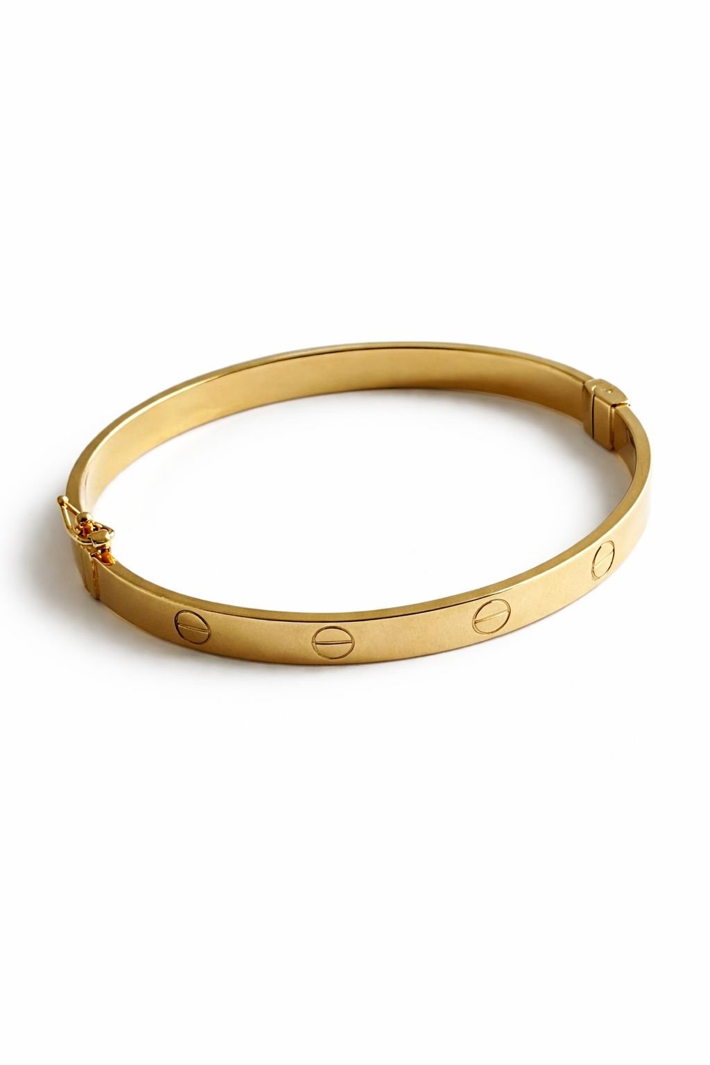 Bracelet rigide d’or 18k, style love, taille 16 (petit poignet), 6.97g (fermoir avec ressort) image 0